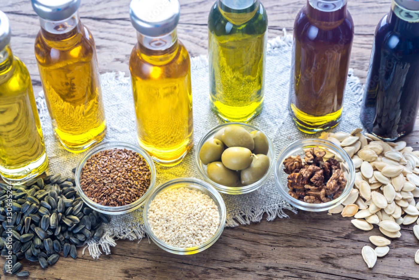 Range of cold pressed oils with seeds